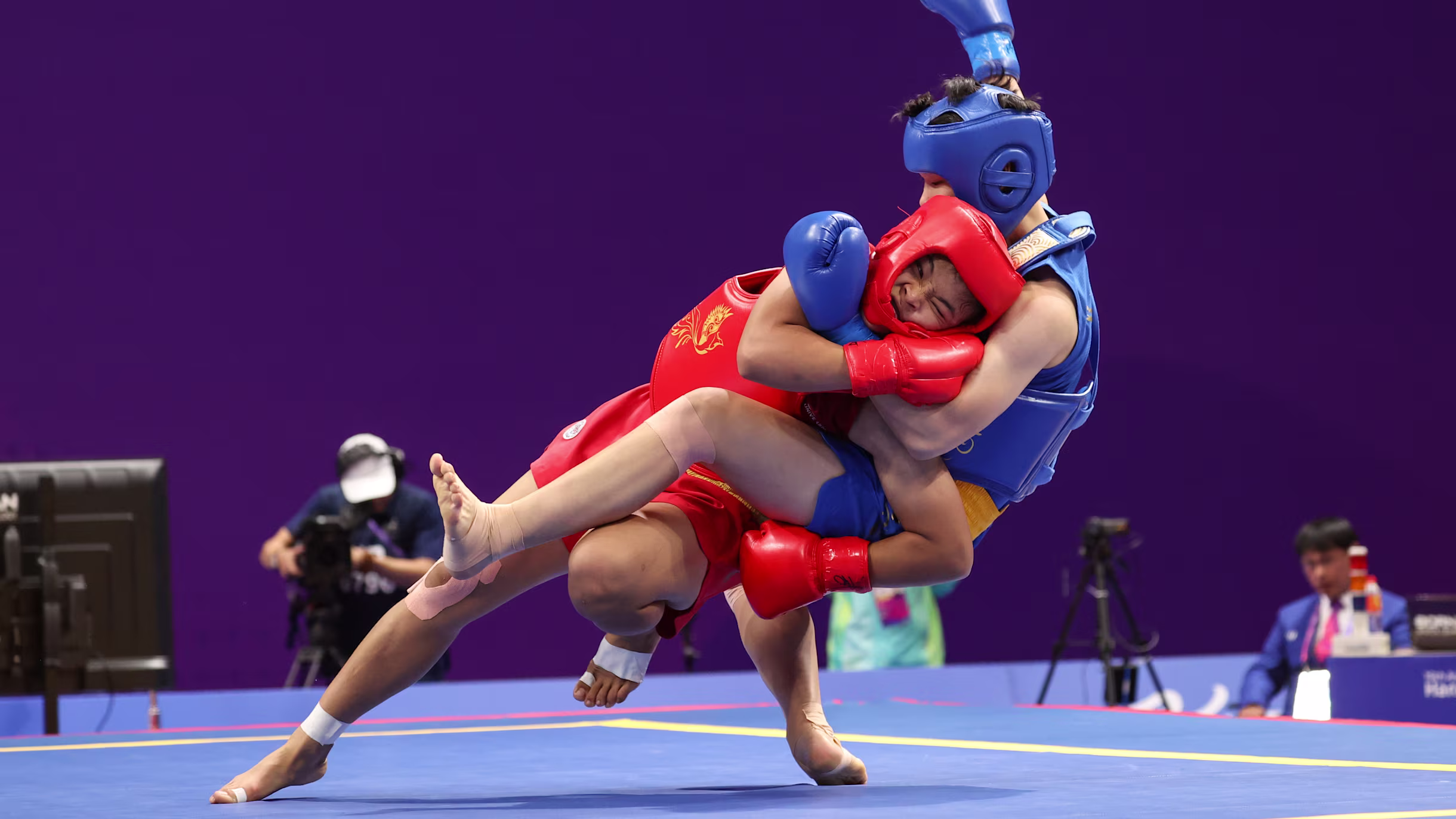Athlete performing a high kick routine