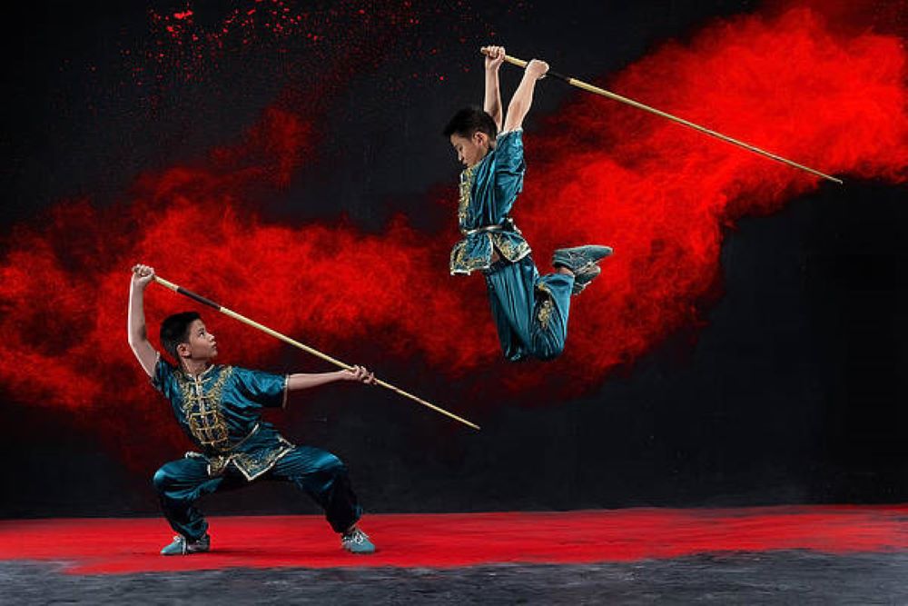 Wushu athletes practicing competitive forms